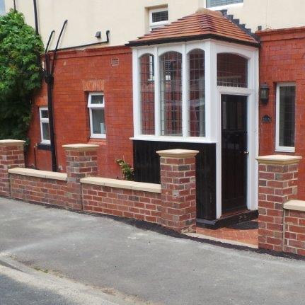 Brick wall with Pillars and Brick Paving